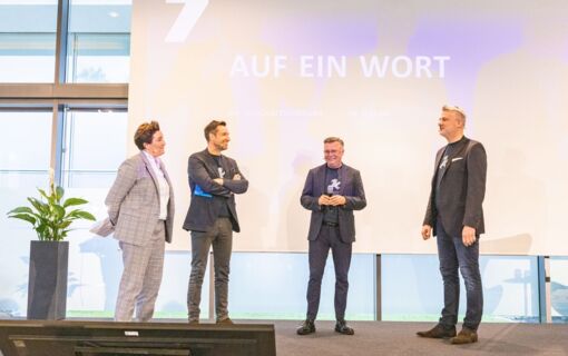 Moderatorin Daniela A. Ben Said mit den Alliance Geschäftsführern Daniel Borgstedt, Jürgen Feldmann und Marko Steinmeier (v.l.n.r.)